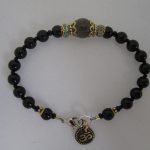 Onyx With Labradorite And Ohm Charm